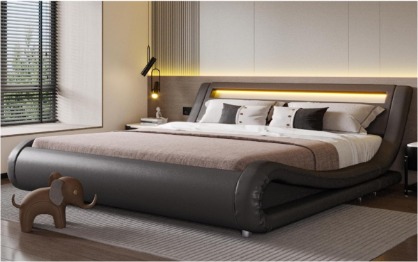 LED King Upholstered Bed: Illuminate your bedroom with the epitome of modern elegance - the SHA CERLIN LED King Upholstered Bed. This deluxe piece features a sleek design and a low-profile sleigh silhouette, effortlessly blending sophistication with contemporary style.