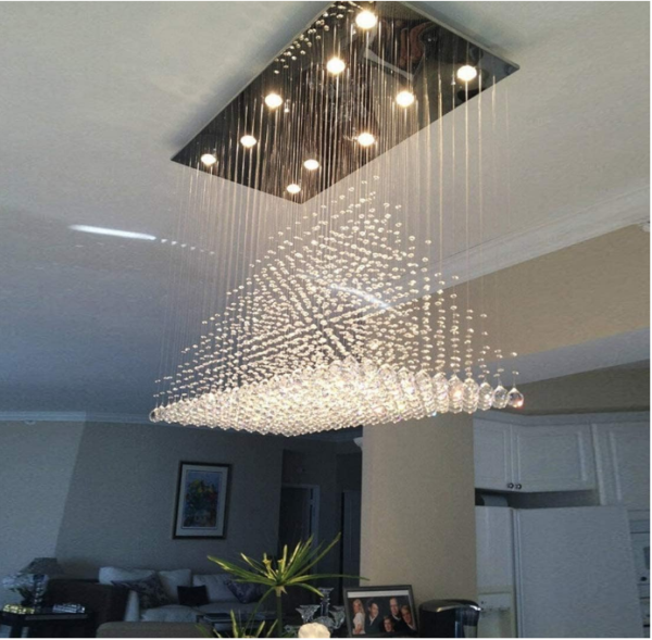 Siljoy Modern Crystal Chandelier: Illuminate your space with timeless elegance using the Siljoy Modern Crystal Chandelier. This exquisite fixture features